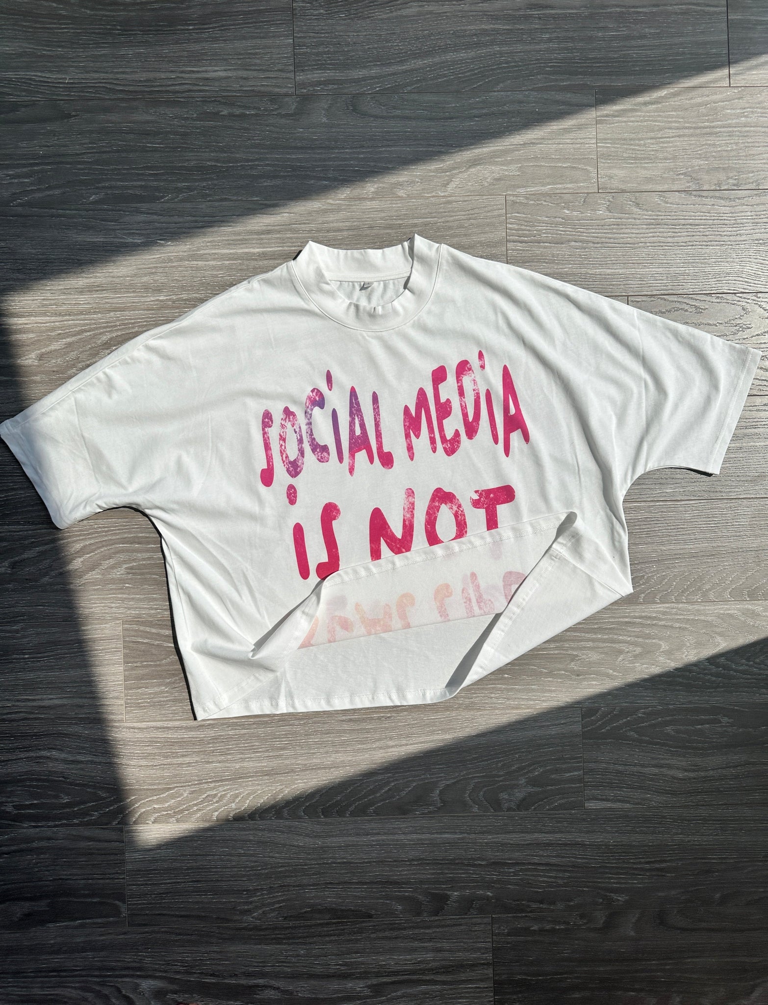 "SOCIAL MEDIA IS NOT REAL LIFE" BOXY CROPPED TEE