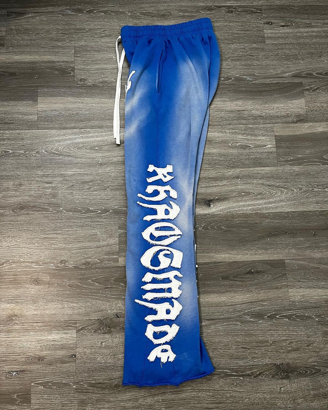 KHAÖS FLARED SWEATPANTS BLUE