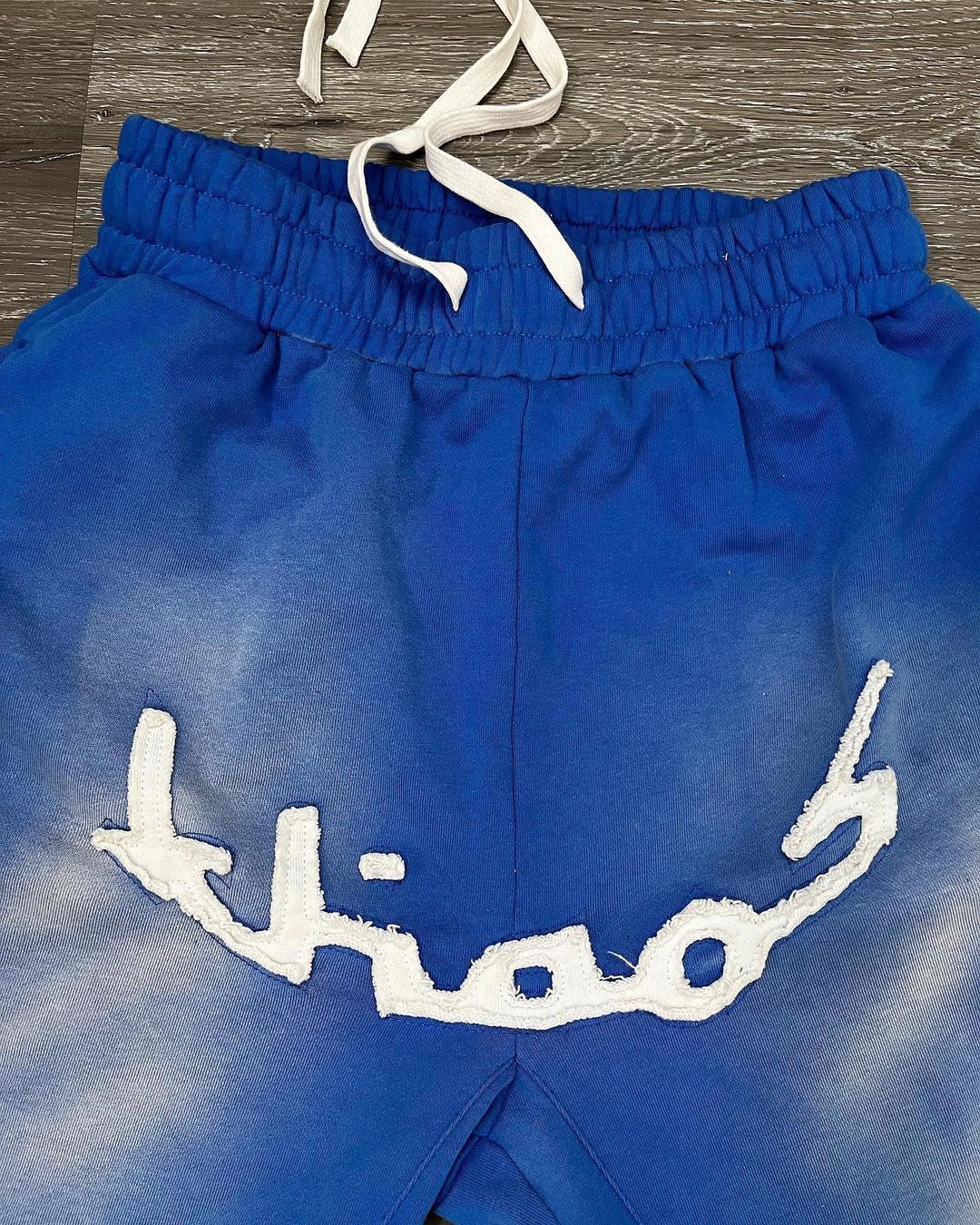 KHAÖS FLARED SWEATPANTS BLUE