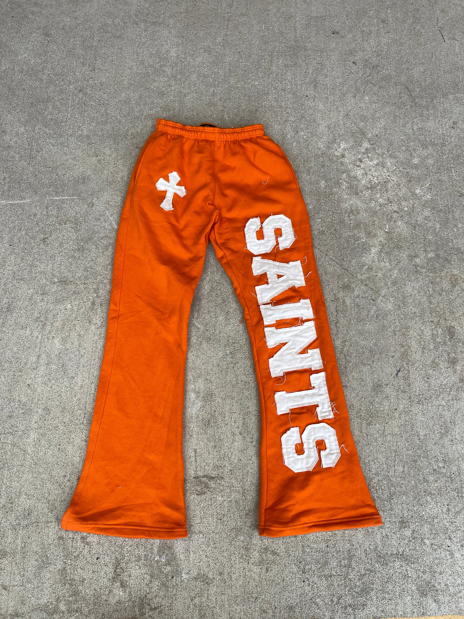 ORANGE FLARED SWEATS