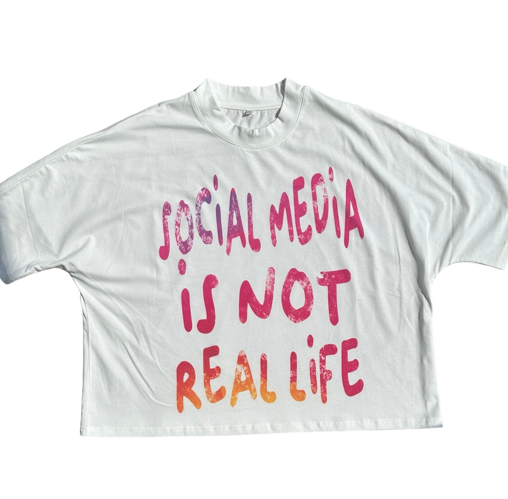 "SOCIAL MEDIA IS NOT REAL LIFE" BOXY CROPPED TEE