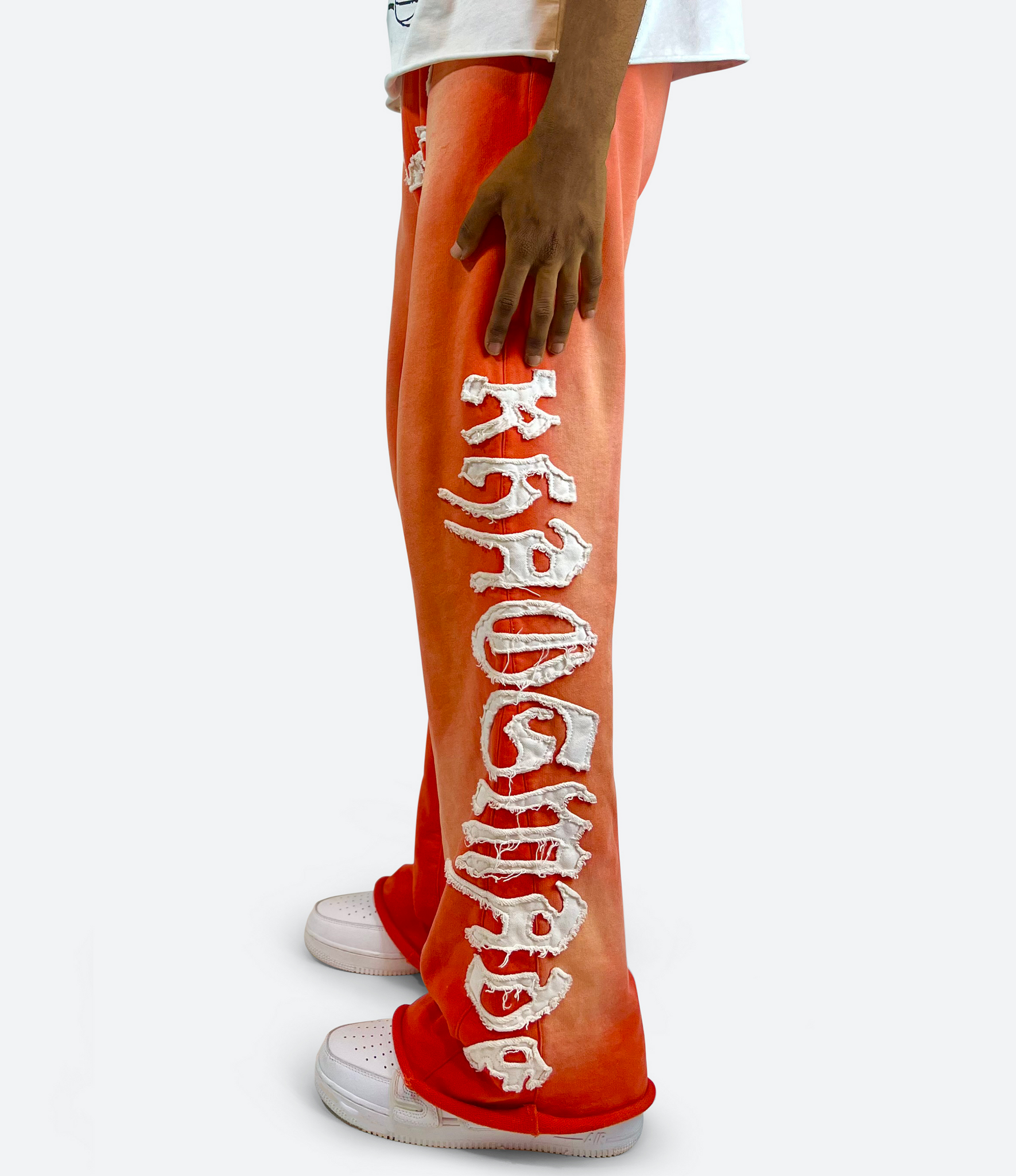 KHAÖS FLARED SWEATPANTS ORANGE